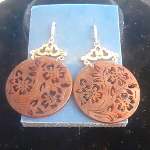 Reddish-Brown Plastic Earrings with Intricate Floral Cutout Design